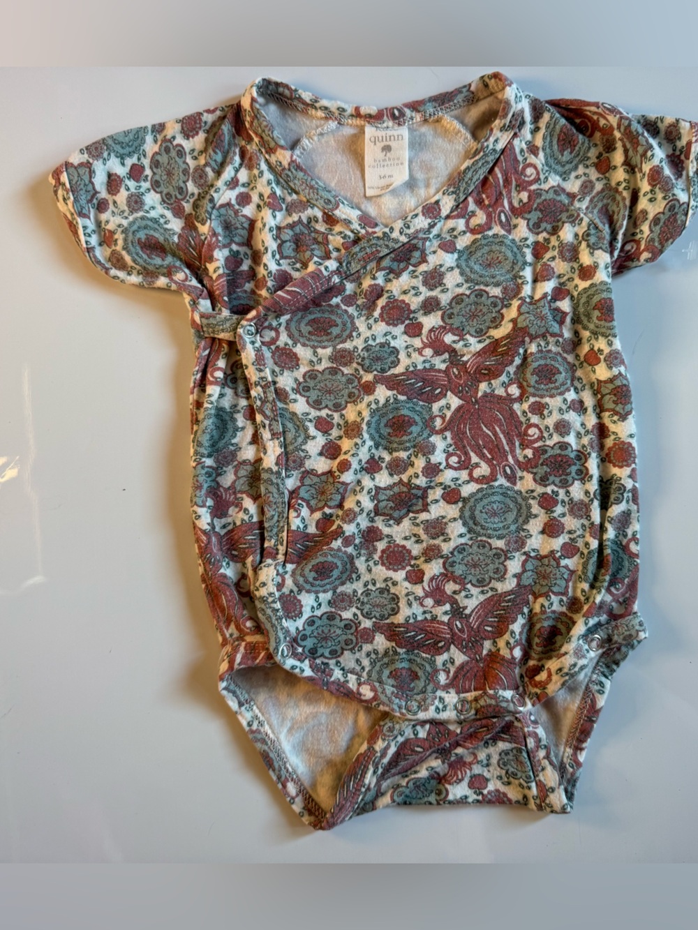 kate quinn Teal, Rust & Cream Paisley Short Sleeve Bodysuit